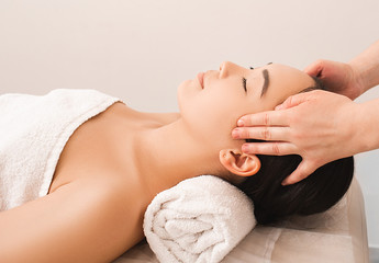 Obraz na płótnie Canvas Thai head Massage therapy. asian woman enjoying massage at the spa. Asian massages. antistress procedures at spa