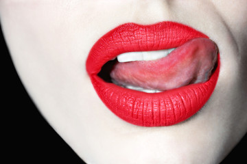 Seductive female lips. Sexy lips with tongue. Female painted lips. Red lips. Defiant lips. Bright...