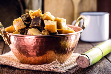 typical sugar cane and molasses sweet, made in brazil and latin america, inside a copper pot, typical cuisine of latin america. Gastronomic tourism concept.