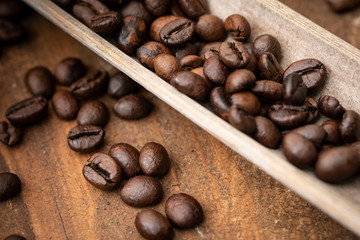 coffee beans on wooden background