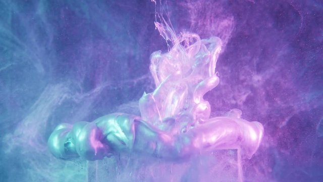 Glitter ink splash. Chaos explosion. Pearl fluid cloud over cube in grape compote purple light.