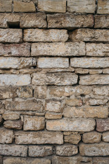 texture of an old wall with natural stone masonry