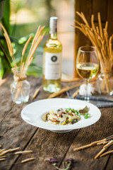 Italian pasta tagliatelle alfredo with mushrooms 