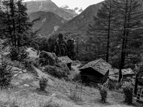 Black and White Photography of a Traditional Alpine wooden houses in the Swiss Alps.