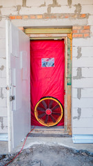Blower door test: Testing the house for airtightness, on the front door installed a powerful fan.