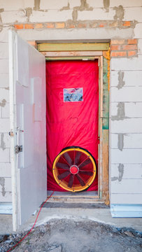 Blower door test: Testing the house for airtightness, on the front door installed a powerful fan.