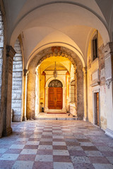Fototapeta na wymiar Portico of the theater of Feltre, Belluno - Italy
