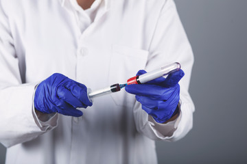 doctor hand blood test result