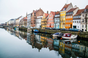 Fototapeta premium colorful townhomes of Copenhagen Denmark along the canal