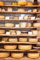 Traditional Dutch cheese displayed for sale in shop market