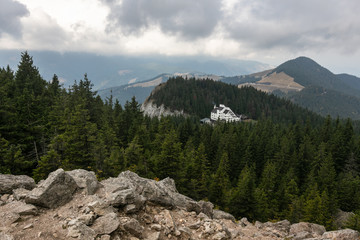 Fototapeta na wymiar carpathian mountains and pine forest cloudy landscape Romanian countryside 