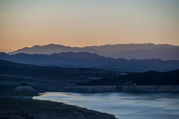 colorful sunset over layers of mountains in death valley national park