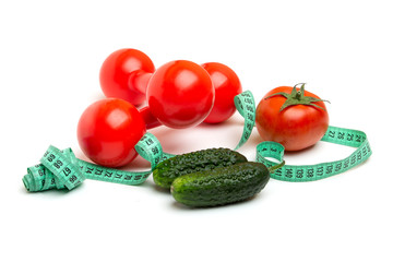cucumber, tomato, red dumbbells, red towel and Measuring tape isolated on white background