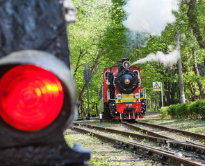 Old soviet steam locomotive and semaphore