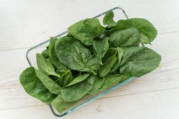 spinach in a transparent bowl