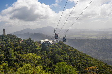 Panoramic view on mountains covered by trees from Sky Bridge in Langkawi Island. Vacation and holidays in Malaysia