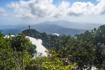 Panoramic view on mountains covered by trees from Sky Bridge in Langkawi Island. Vacation and holidays in Malaysia