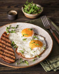 fried eggs with green