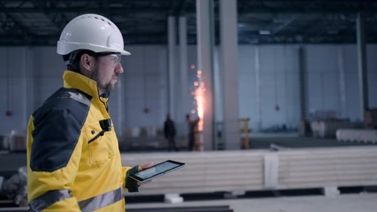 Architect or engineer working, browsing building project indoor of construction site with blueprint plan. businessman worker, man male construction engineers or architects working people. Engineer In - Powered by Adobe