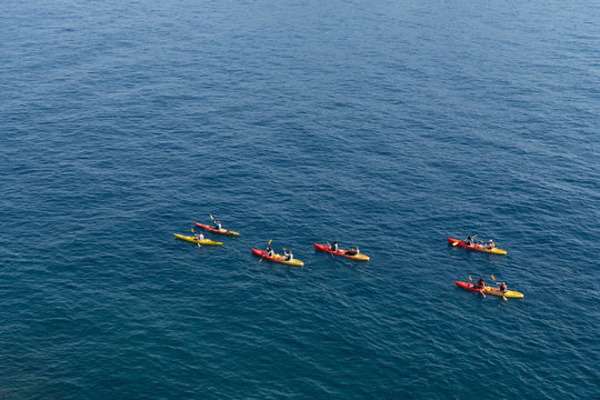 Top View of Tourist Paddling Kayak on the Ocean © charnsitr