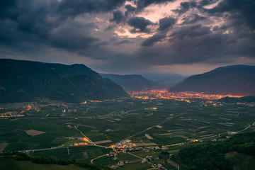 View of Bolzano and the surrounding villages of the high mountain hiking trail in Appiano in...