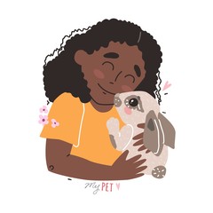 little Black african american girl holding a rabbit in her arms
