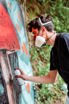 Graffiti artist painting