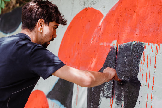 Graffiti artist painting