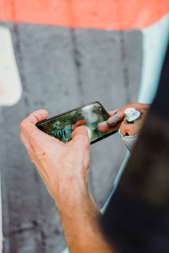 Graffiti artist painting