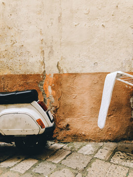 Italian Scooter and White Laundry