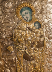 Ancient Christian icon covered with gilded riza.
