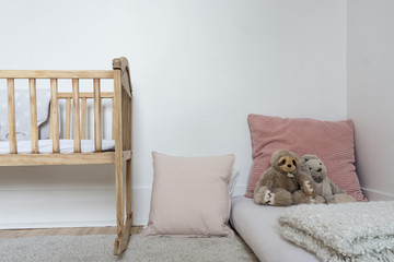 Kid's room with toys and baby bed