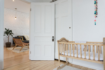 Kid's room with toys and baby bed