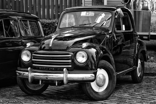 BERLIN - MAY 11, 2013: The subcompact Fiat 500 Topolino, 26. Oldtimer-Tage Berlin-Brandenburg. Black and white.