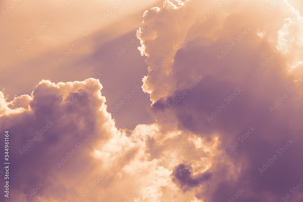 Wall mural fantastic orange violet purple sky, beautiful evening sky background. sunlight, sun rays through clo