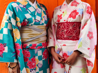 Midsection of women in kimono