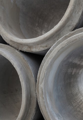 Stack of new concrete pipes.