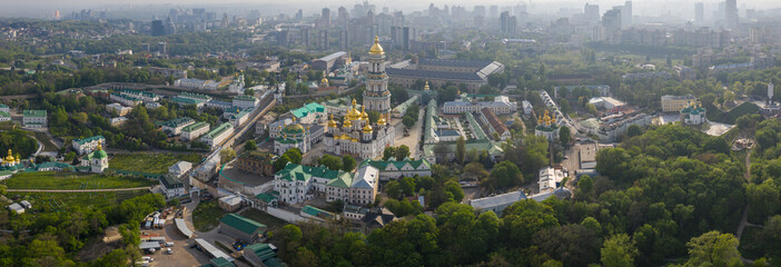 Aerial view of Kiev Pechersk Lavra illuminated by the sunset rays of the sun, Kyiv, Ukraine
