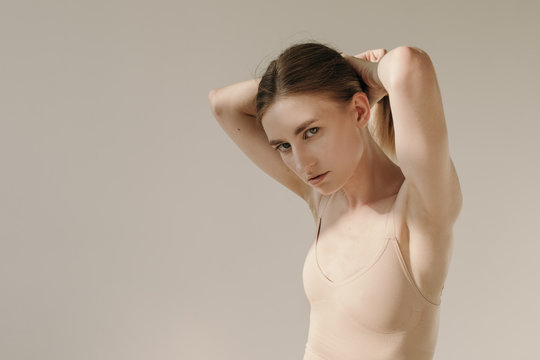 Sensual lady doing ponytail