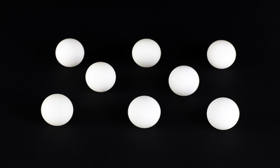 abstract geometric white balls isolated on black background