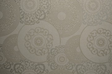 Fototapeta na wymiar Abstract patterns on the wallpaper gray