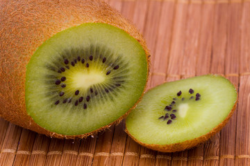 Kiwi fruit cutaway. Food macro shot.