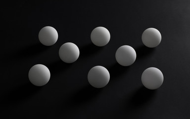 abstract geometric white balls isolated on black background