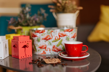 Close up of red cup of espresso coffee on the table