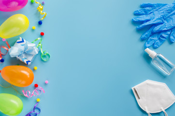 Concept quarantine birthday. Festive blue background. Social distance, party online, isolation,...