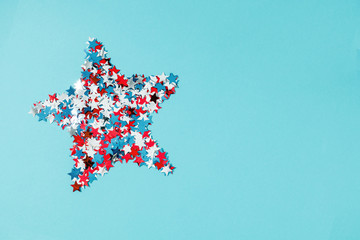 4th of July American Independence Day. Happy Independence Day. Red, blue and white star confetti,...