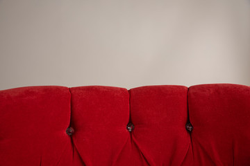upholstery texture in red color on beige background