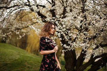 
spring beautiful girl walk with flowers