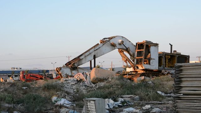 abandoned dilapidated excavator. war or post apocaliptic plot