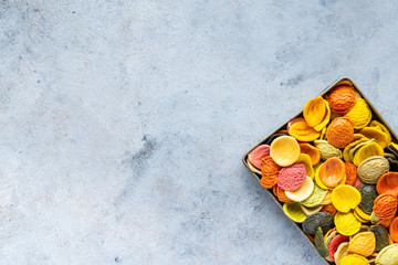 Italian Macaroni Pasta raw food background, texture close up. The concept of Italian cuisine, cooking with love.
